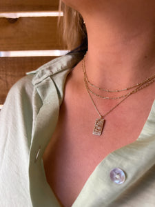 the world multi layered necklace