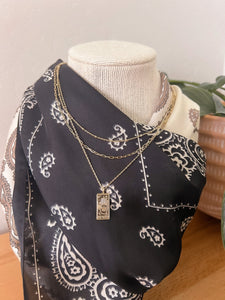 the world multi layered necklace